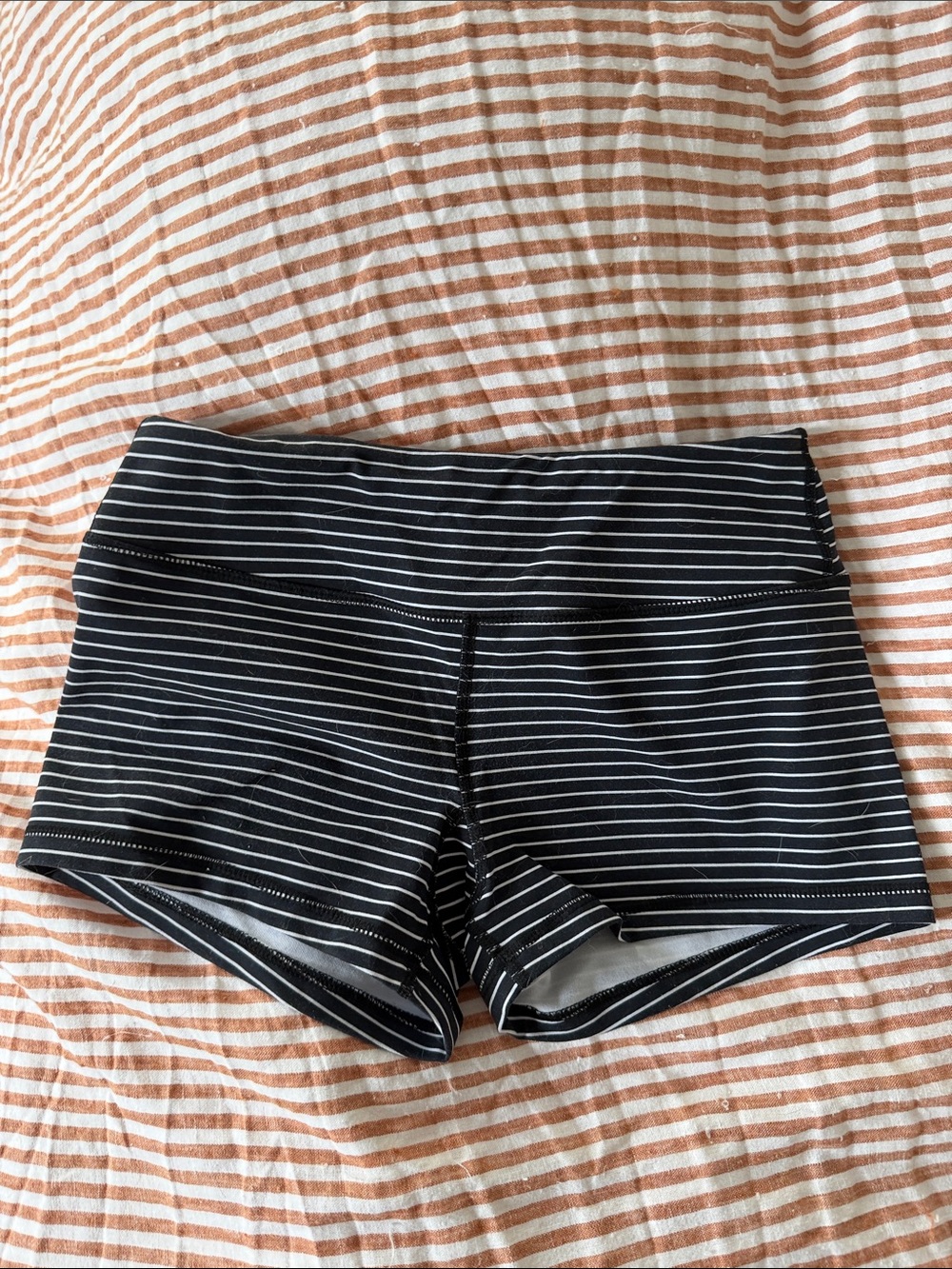 Savage Barbell striped booty shorts